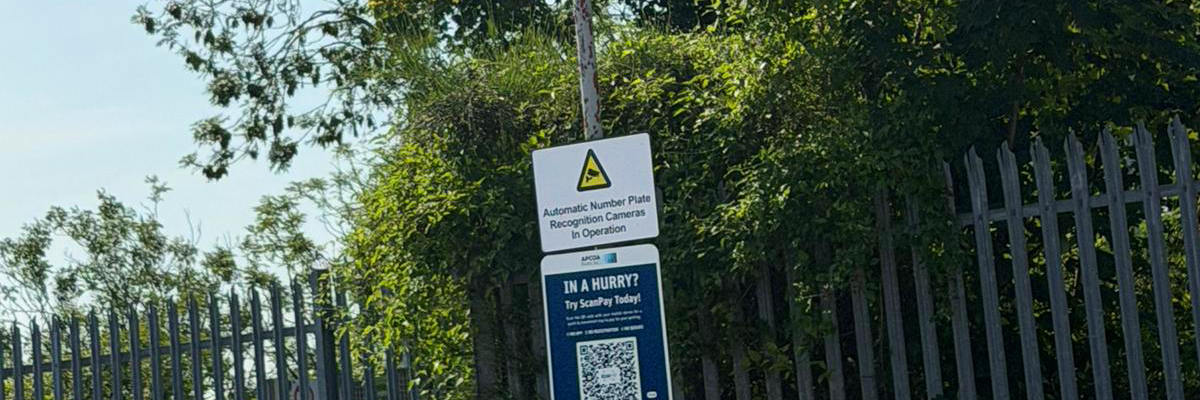 A sign in a car park stating that automatic number plate recognition cameras are in operation