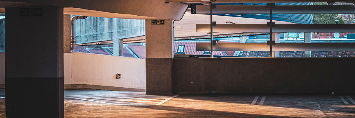 Sun shining through an empty multi-storey car park