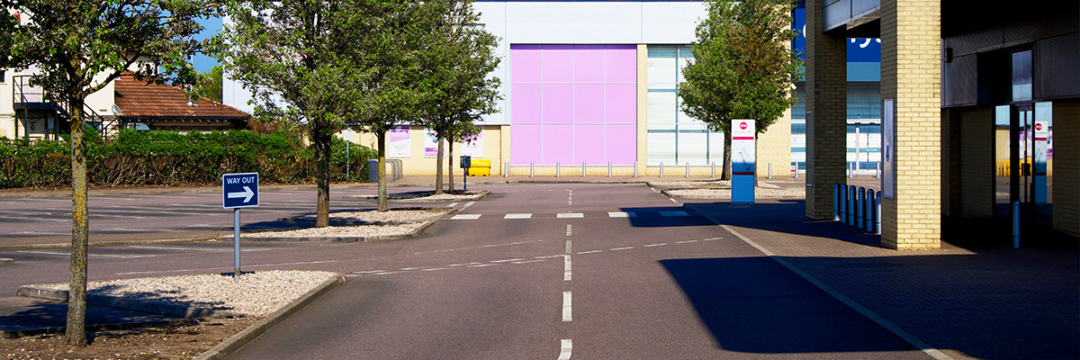 Empty car park with clear signage and exit routes