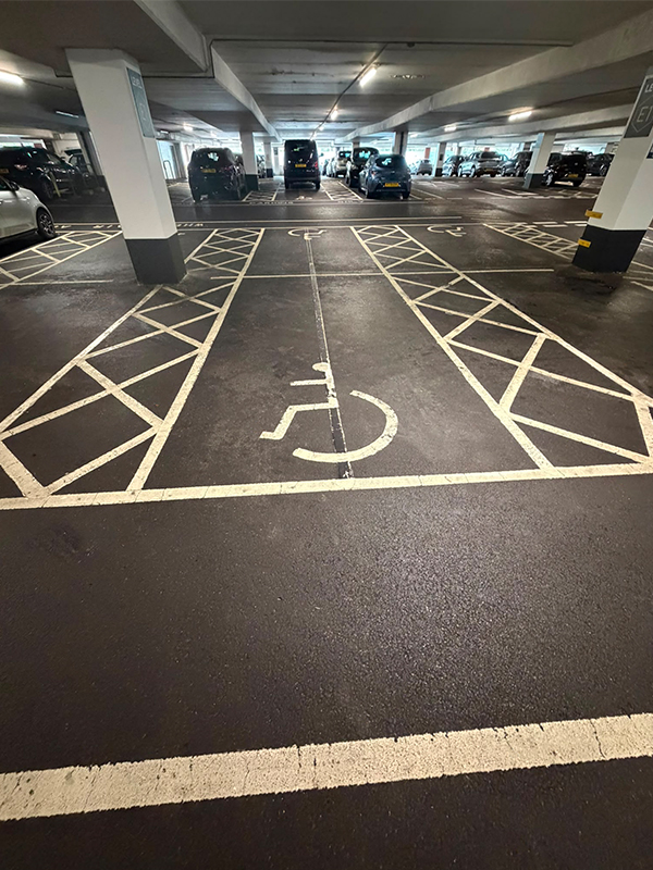 Empty disabled bay in car park