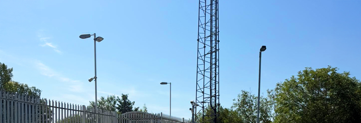 Street lamps providing abundant lighting in car park